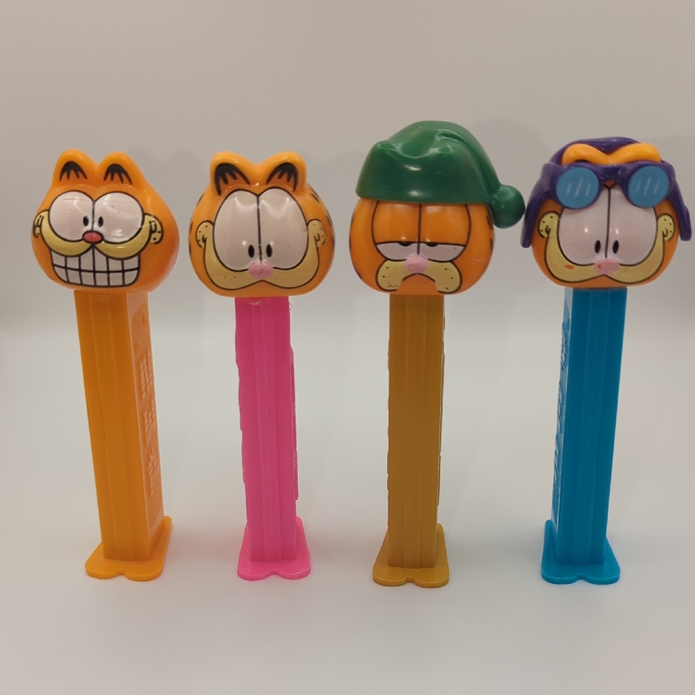 Garfield Character Pez Candy Dispenser Set - Orange, Pink, Blue
